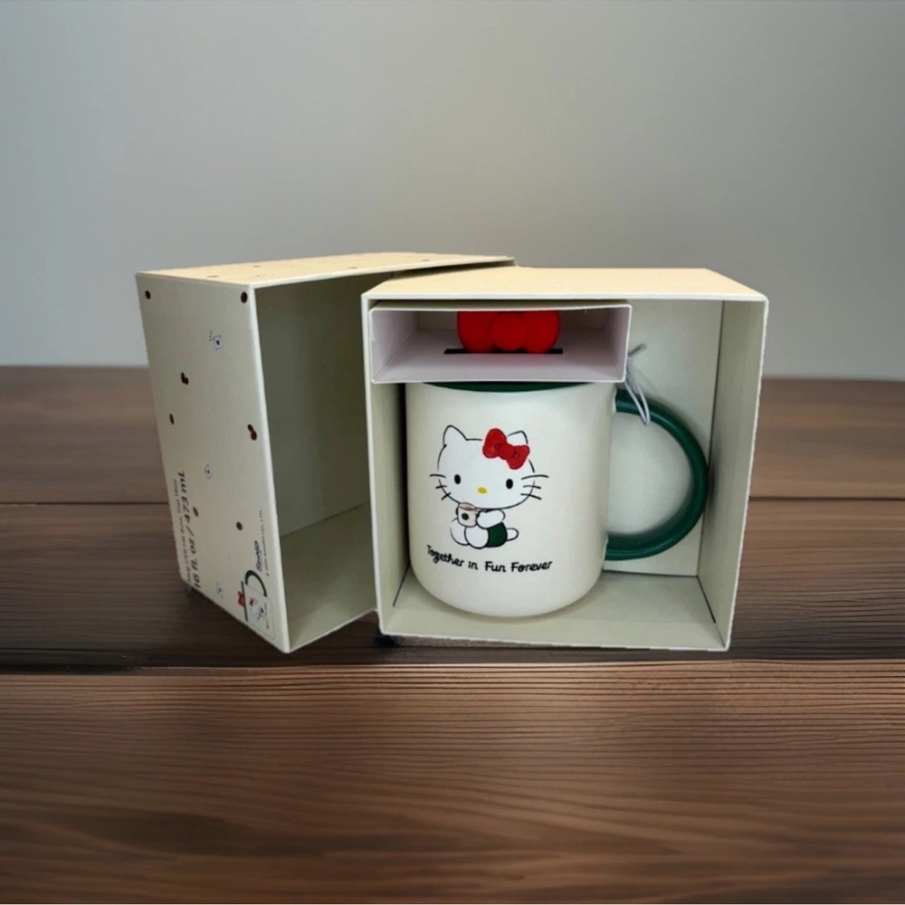 Starbucks Hello Kitty Collab Ceramic Mug Red Bow And Green Lid 2025 16oz in hand